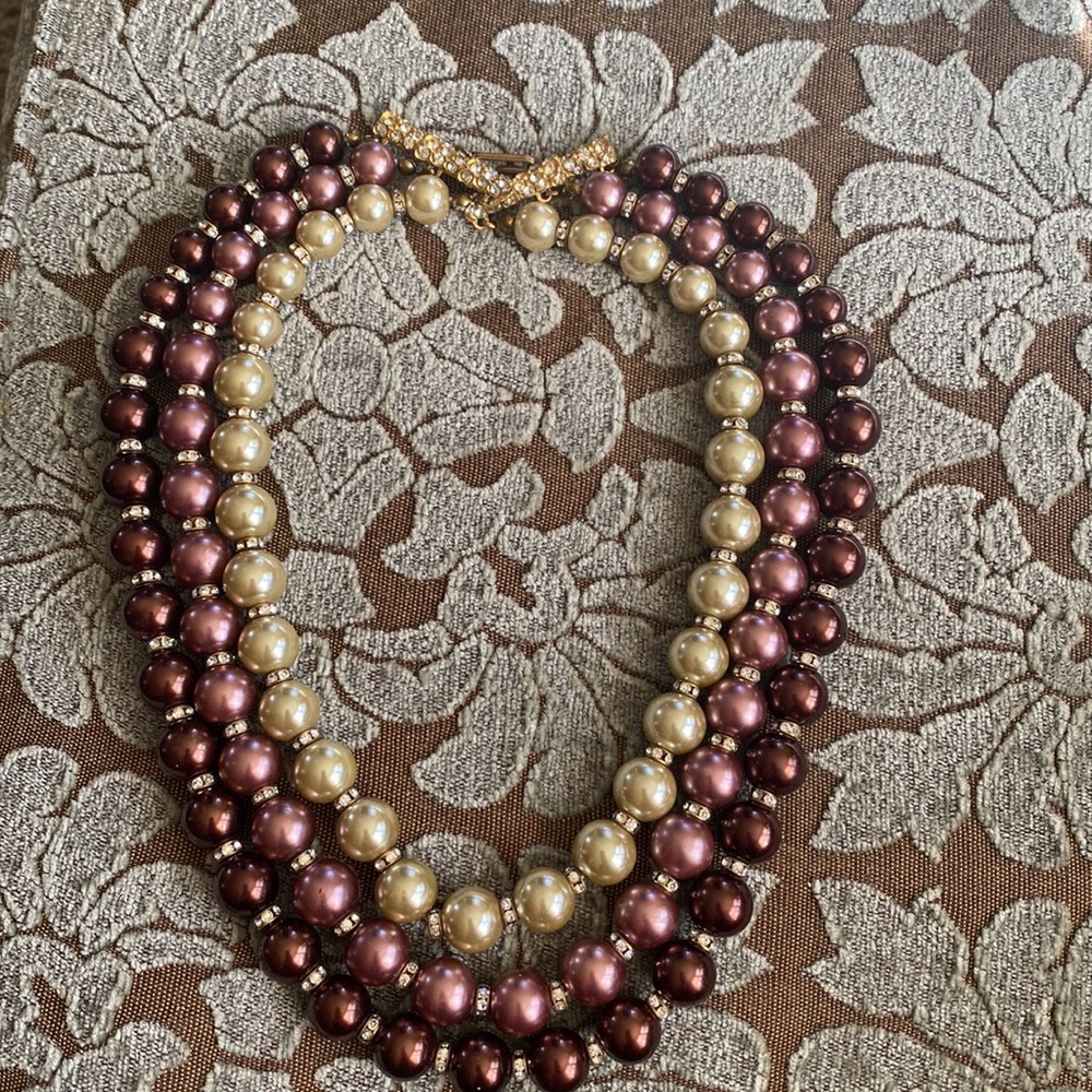 Gorgeous Vintage 3 Strand Necklace.The rhinestones between the beads are bright.